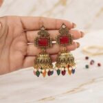Traditional Antique Gold Jhumka Earrings with Red Stones & Multi-Color Beads