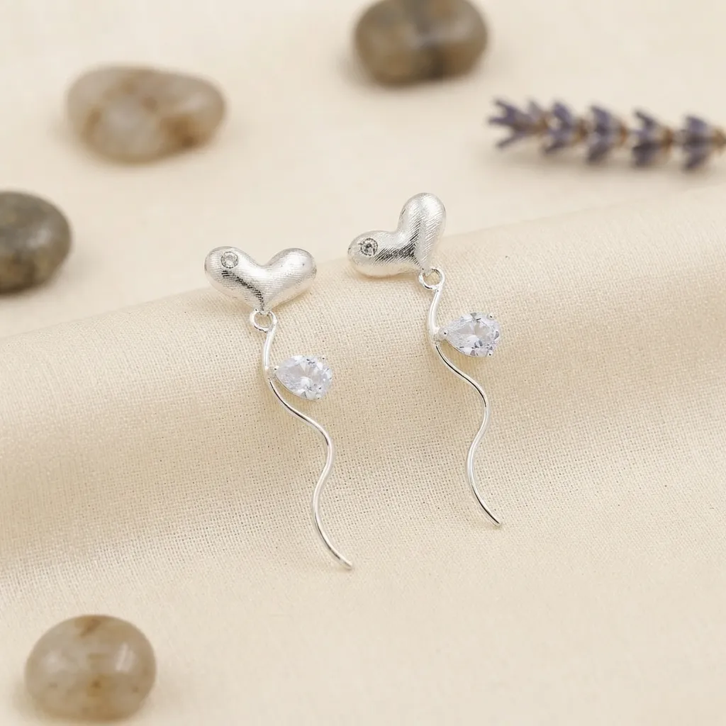 Gemini_Generated_Image_i4rif8i4rif8i4ri-1.webp Heart Earrings -BXI - Image 1