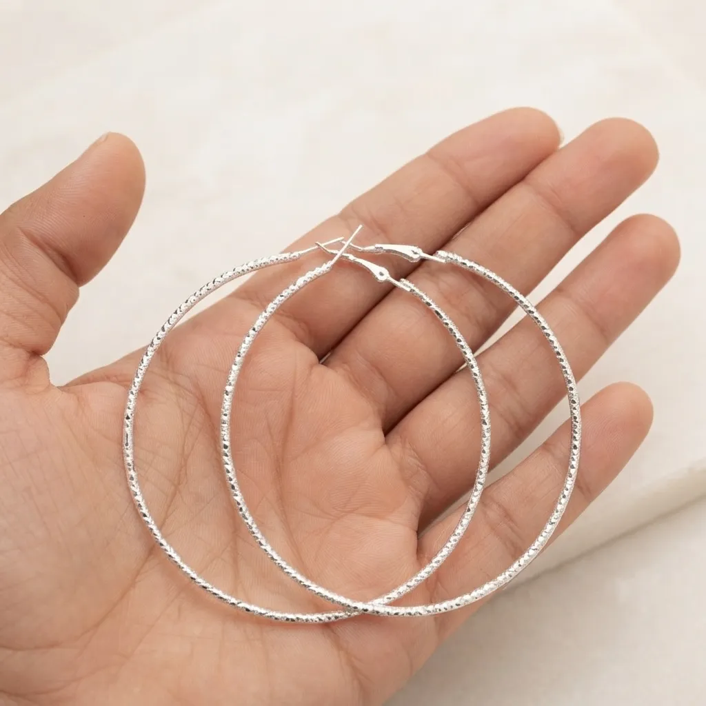 Silver Hoop Earrings - BXG Silver Hoop Earrings - BXG - Image 1