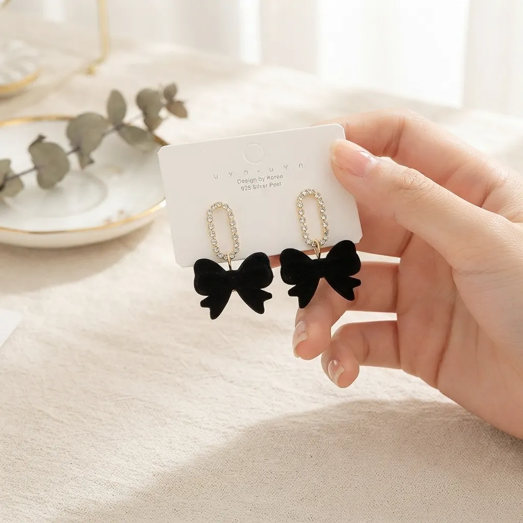 Bow Earrings - BXK Bow Earrings - BXK - Image 1